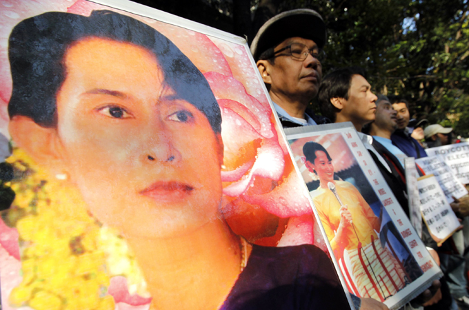 Supporters of Myanmar''s detained opposition leader Aung San Suu Kyi demonstrating