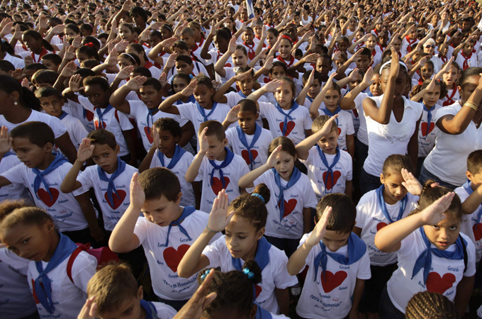 cuba kids celebrate [Reuters]