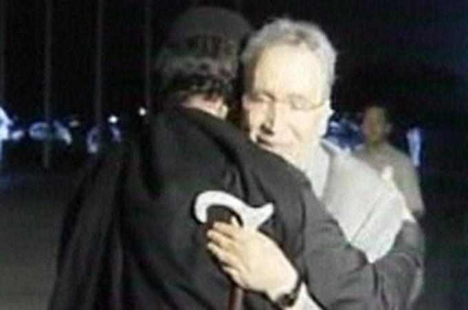 Video grab of Libyan leader Muammar Gaddafi hugging convicted Lockerbie bomber Abdel Basset al-Megrahi in Tripoli