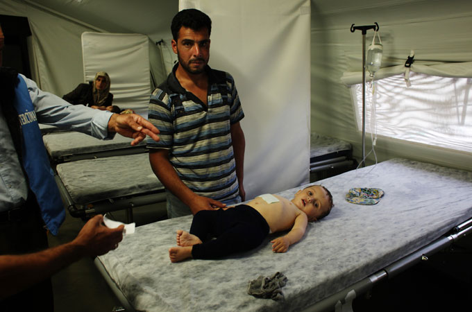 Father and Child in Turkey refugee camp