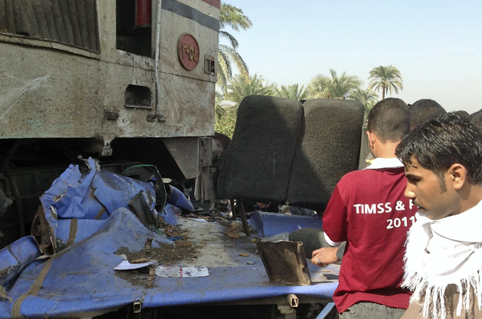 Egypt train, school bus collision kills dozens