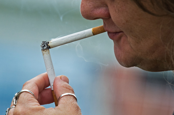 Donna Thompson takes a cigarette break