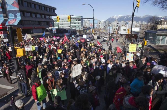 Demonstrators rally during the