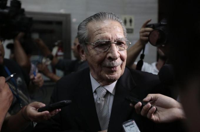 Former Guatemalan dictator Rios Montt speaks with media at end of session of his genocide trial, at Supreme Court of Justice in Guatemala City