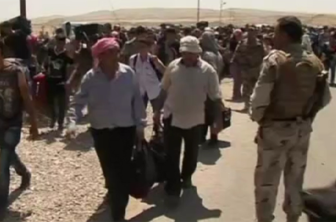 Syrian Kurdish refugees pour into Iraq
