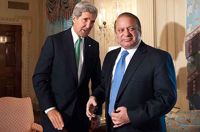 In response to drone strikes, "the feeble State of Pakistan can do nothing more than stretch out its bloodstained hand for more aid dollars", writes the author [AFP]