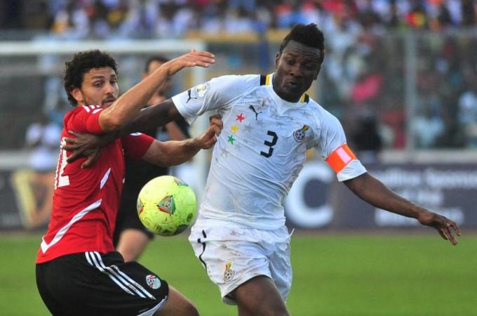Black Stars captain Gyan, right, says Ghana will be composed but not relaxed against Egypt [AP]