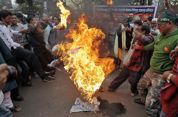 More than 115 people have died in recent political violence ahead of elections on January 5 [AP]