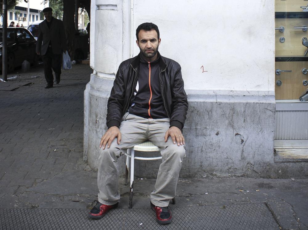 <p>Khlifa, a 31-year-old father of two, said he is coping with the bad economy by selling smuggled cigarettes. Many cannot afford to buy the cigarettes on sale in shops.</p>