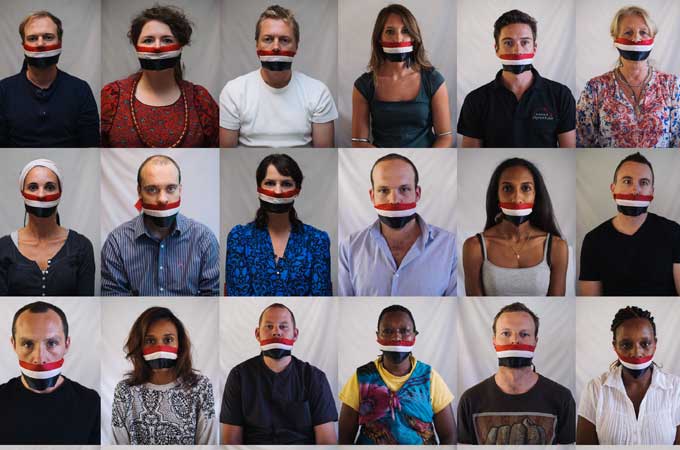 Gagged by the flag: East Africa journalists protest against Egypt's crackdown on journalists [Phil Moore]