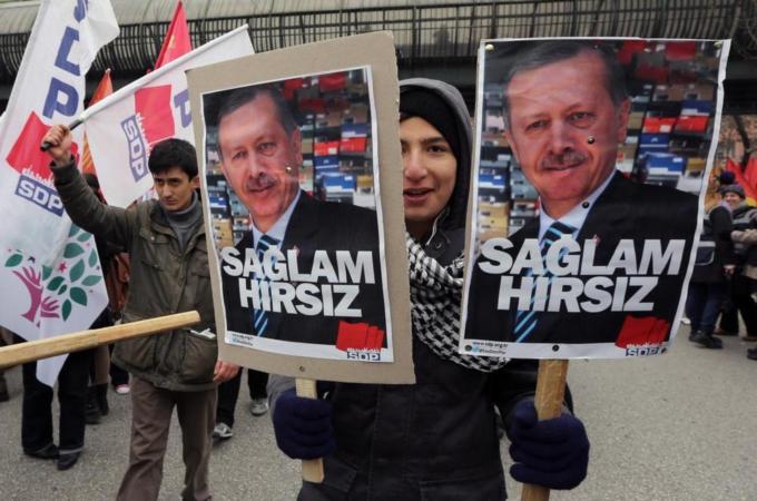 Recep Erdogan's government has been mired in a corruption scandal [AP]