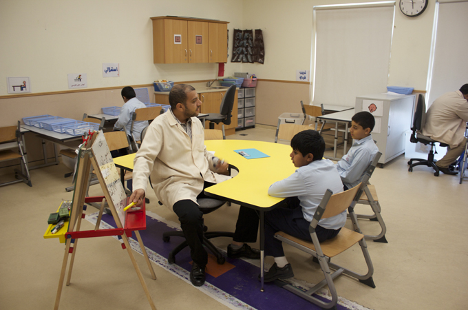 Instructors at Shafallah Center say a structured environment reduces the anxiety of students with autism [Jassim Mater/Al Jazeera]