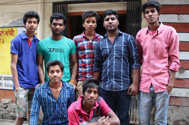 Youth group work to spread anti-drug message in neighbourhood with Master Ajit [Toral Varia/ Al Jazeera]