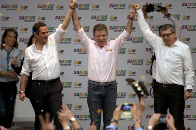 In his electoral campaign, Colombian President Juan Manuel Santos has focused on the ongoing peace talks with FARC [AFP/Getty Images]