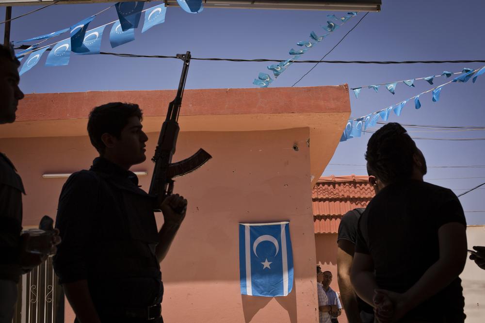 <p>Turkmen militiamen gather at the headquarters of the Iraqi Turkmen Front (ITF) in Kirkuk. The head of the ITF, Arshad Salihi, announced the mobilisation of Turkmen militia in response to the ongoing crisis in Iraq.</p>