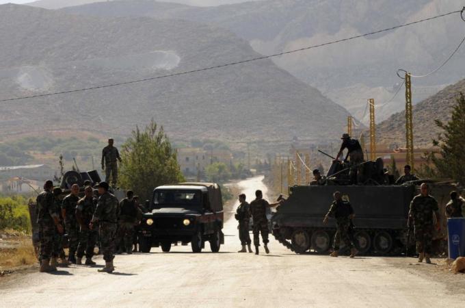 Eight Lebanese soldiers have been killed in clashes near Arsal [Reuters]