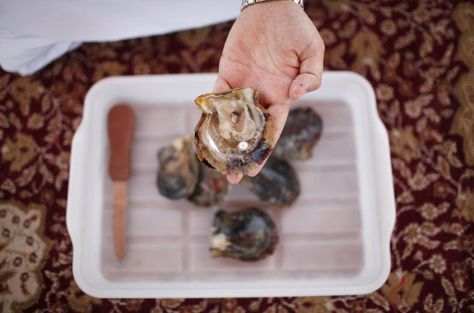 At its height, the UAE's pearl diving industry employed around 80,000 people [Reuters]