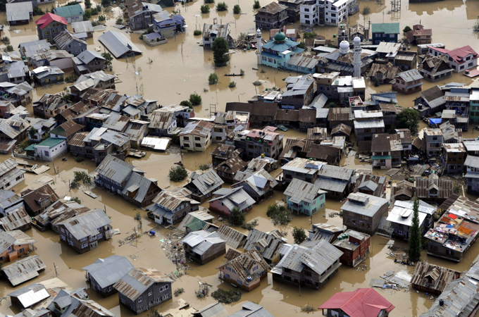 Accusations that authorities rescued top bureaucrats, tourists, and non-locals first runs rife in Kashmir [EPA]