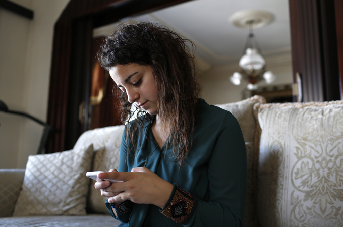 Farah Baker's posts on Twitter made the 16-year-old a social media sensation during the Gaza war [Reuters]