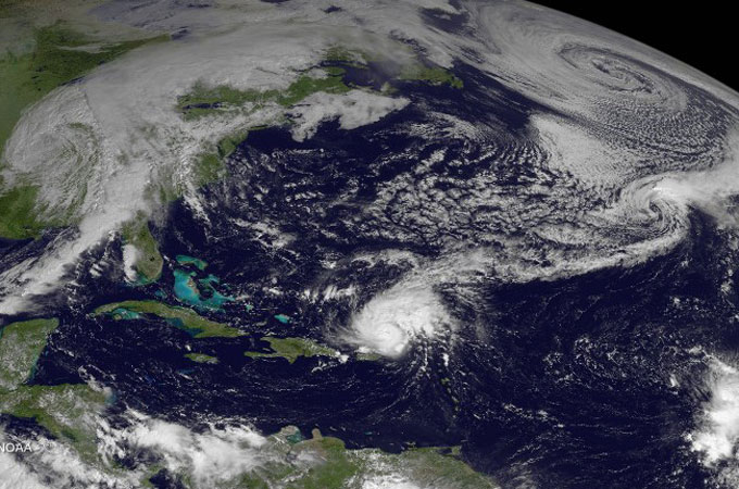 Gonzalo made a glancing blow across the northern Leeward Islands on Monday into Tuesday morning [AFP/NASA]