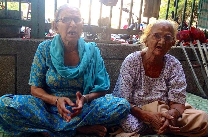 Two sisters Leela Kaur, left, and Jasibai, right, lost their families in the riots [Betwa Sharma/ Al Jazeera]
