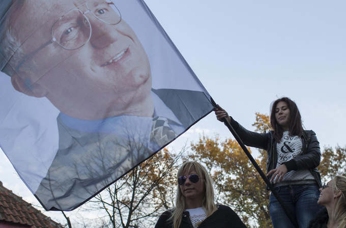 Supporters of Seselj greeted him like a hero on his return to Belgrade on Wednesday [Reuters]
