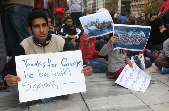 Syrian refugees gather at Syntagma Square calling for Greek government assistance [Getty]