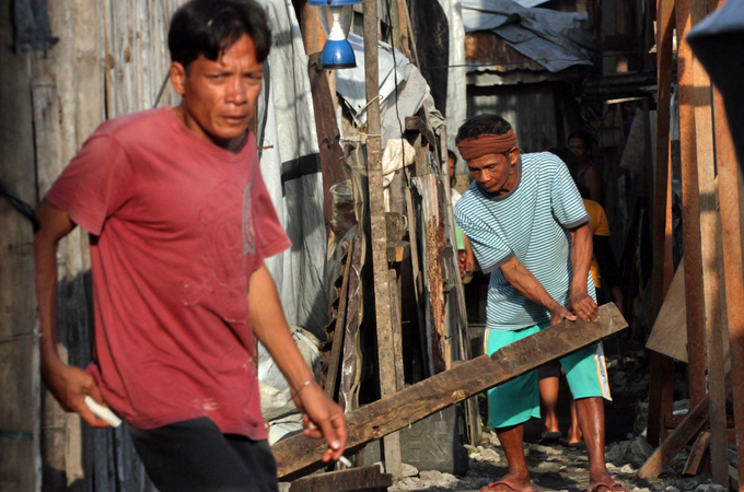 Reconstruction continues after 6,300 people were killed a year ago by super typhoon Haiyan [Jason Gutierrez]