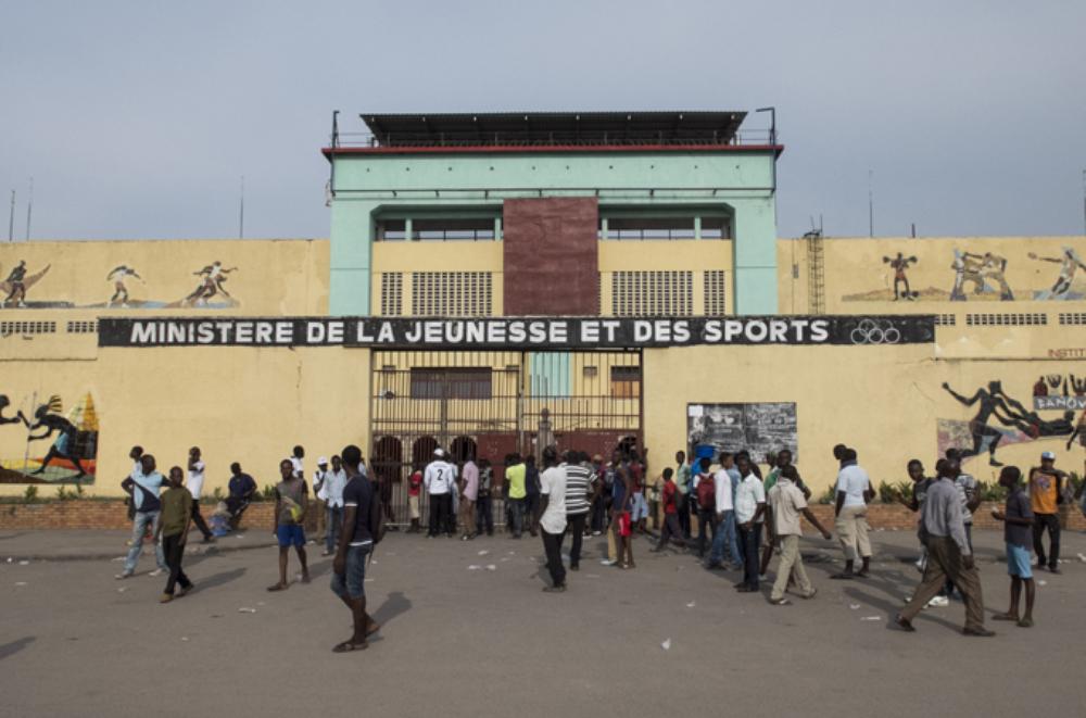 <p>The Congolese Ministry of Youth and Sports, located inside the 20 Mai Stadium, hosts daily boxing practices. This location houses the locker room used by Ali in the Rumble.</p>