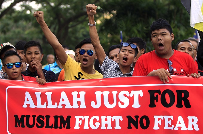 On Christmas Eve, concerns have been voiced over a Muslim-Christian divide with the word 'Allah' [AP]