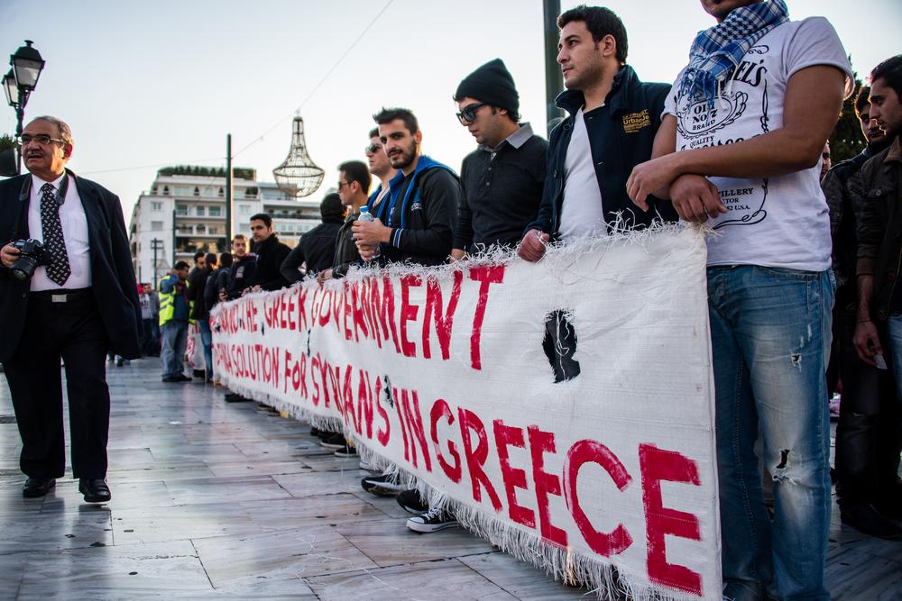 <p>Protesters at Syntagma square demand the Greek government find a solution for Syrian refugees. </p>
