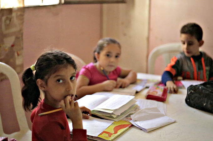 The heaving refugee camp, originally built for 3,000, now houses up to 22,000 people [Amanda Fisher/Al Jazeera]