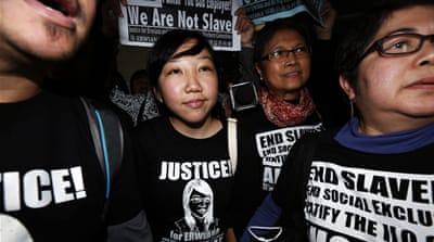 Erwiana Sulistyaningsih (C), an abused Indonesian domestic helper [Reuters]