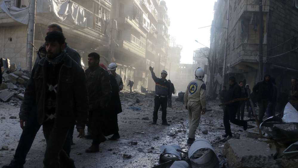 Residents look for survivors amid rubble of collapsed buildings after what activists said were air strikes by forces loyal to Syria''s President Bashar al-Assad in the al-Shaar neighborhood of Aleppo