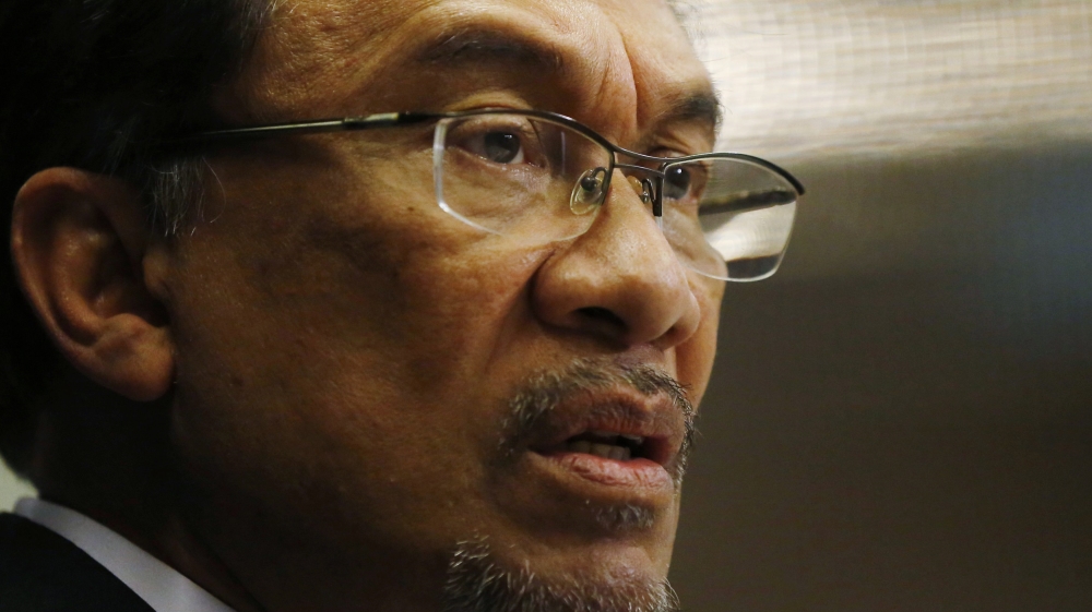 Malaysia''s opposition leader Anwar Ibrahim speaks to the media ahead of the verdict in his final appeal against a conviction for sodomy in Kuala Lumpur