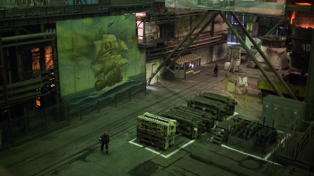 Hand painted murals adorn the floor of the Ilyich Iron and Steel Works in Mariupol [John Wendle/Al Jazeera]