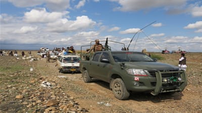 The army is providing security to all IDP convoys, with soldiers escorting each family back to their homes [Asad Hashim/Al Jazeera]