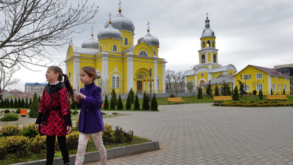 Children walk in a park in Comrat city, the main city of Gagauzia on April 6, 2014. Gagauzia, an autonomous region of Moldova