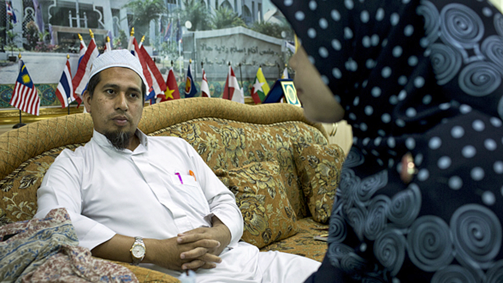 Imam Abdulloh at the Islamic Council Centre in Yala advises women to cut their baby girls after birth because it can help control their sexual urges when they grow up. [Lillian Suwanrumpha]