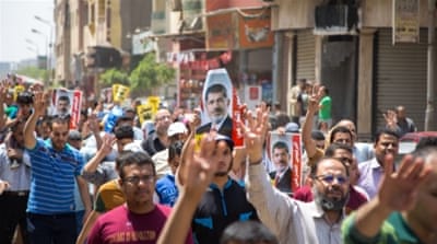 Egyptian demonstrators stage an anti-government protest [Getty]