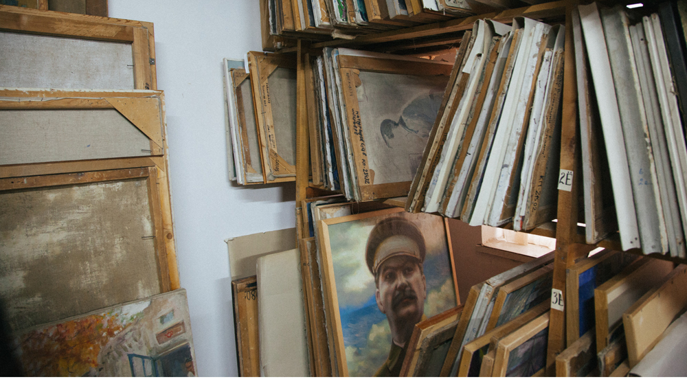 A portrait of Soviet leader Josef Stalin in the Savitsky museum’s depository [Timur Karpov/Al Jazeera]