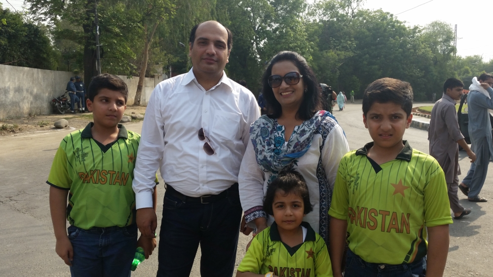 Rizwan Chaudhry, 35, a banker from Lahore, brought his wife and children to watch a cricket match for the very time [Asad Hashim/Al Jazeera]