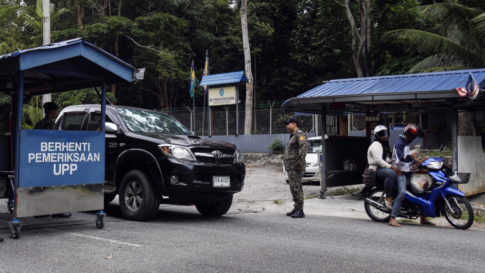 Malaysia camps graves