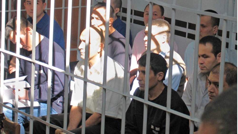 Rebels involved in mass disturbances in Andizhan in May, 2005 appear in the supreme court of Uzbekistan [Getty]