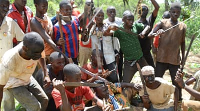 Christian anti-Balaka fighters pose during a training session [AFP]