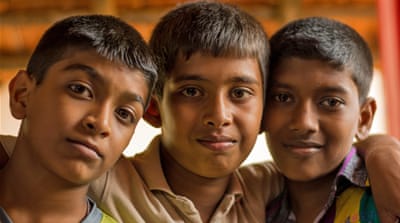 Kavin and his friends [Dinouk Colombage/Al Jazeera] 