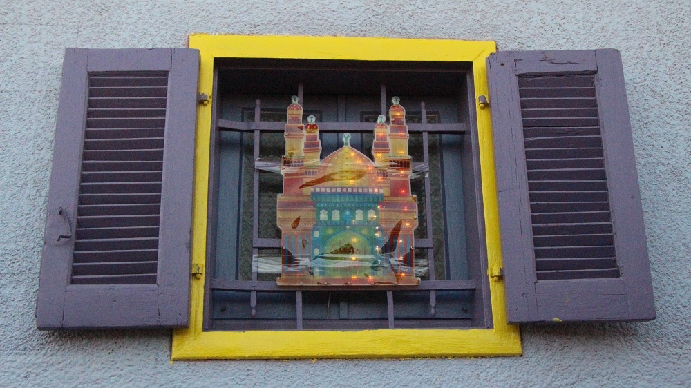 With the help of a local institute, the walls, houses and alleys of this community have been transformed into bright expanses of colour [Walaa Ghussein/Al Jazeera]