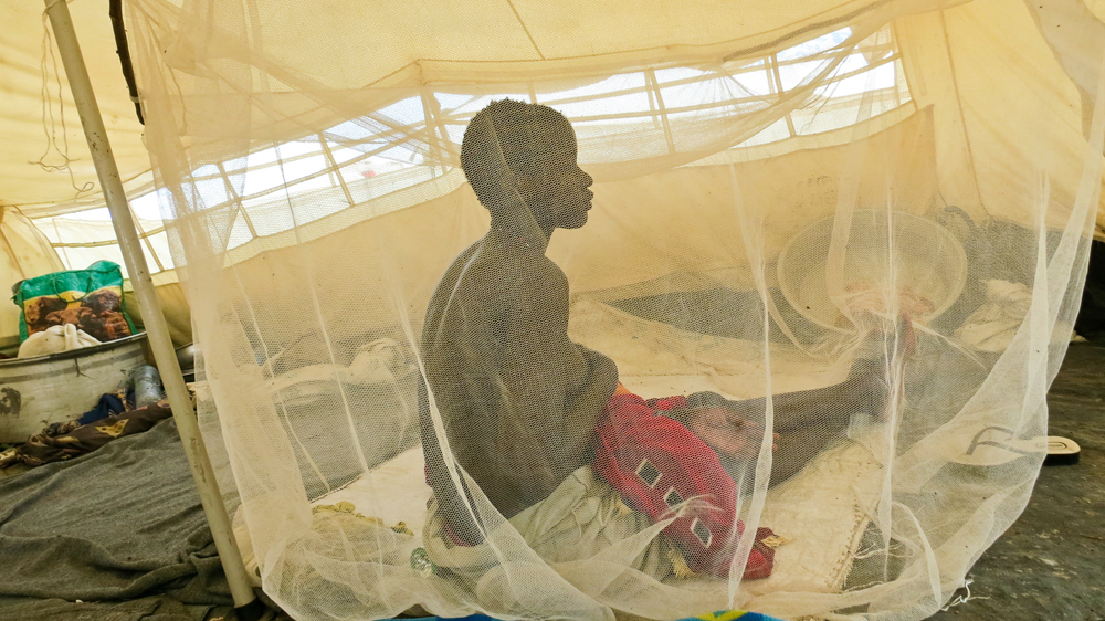 Nyanial, 22, nurses one of her three children in the UNMISS camp near Bentiu in June. Soldiers and militia attacked her town in Koch county in May 2015.