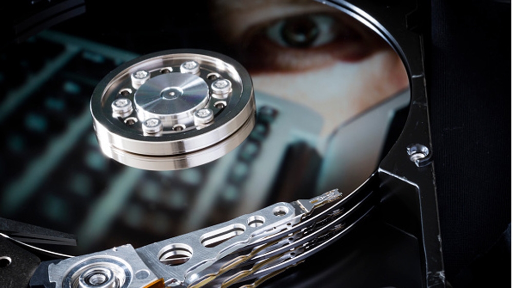 Symbolic photo for data protection, reflection of an eye and laptop in a computer hard drive on January 29, 2015 in Berlin, Germany [Getty]