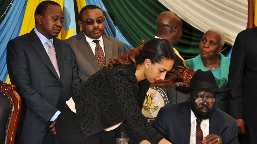 Kiir, who had asked for time to sign the peace deal before doing so on Wednesday, noted that he had reservations [Reuters]